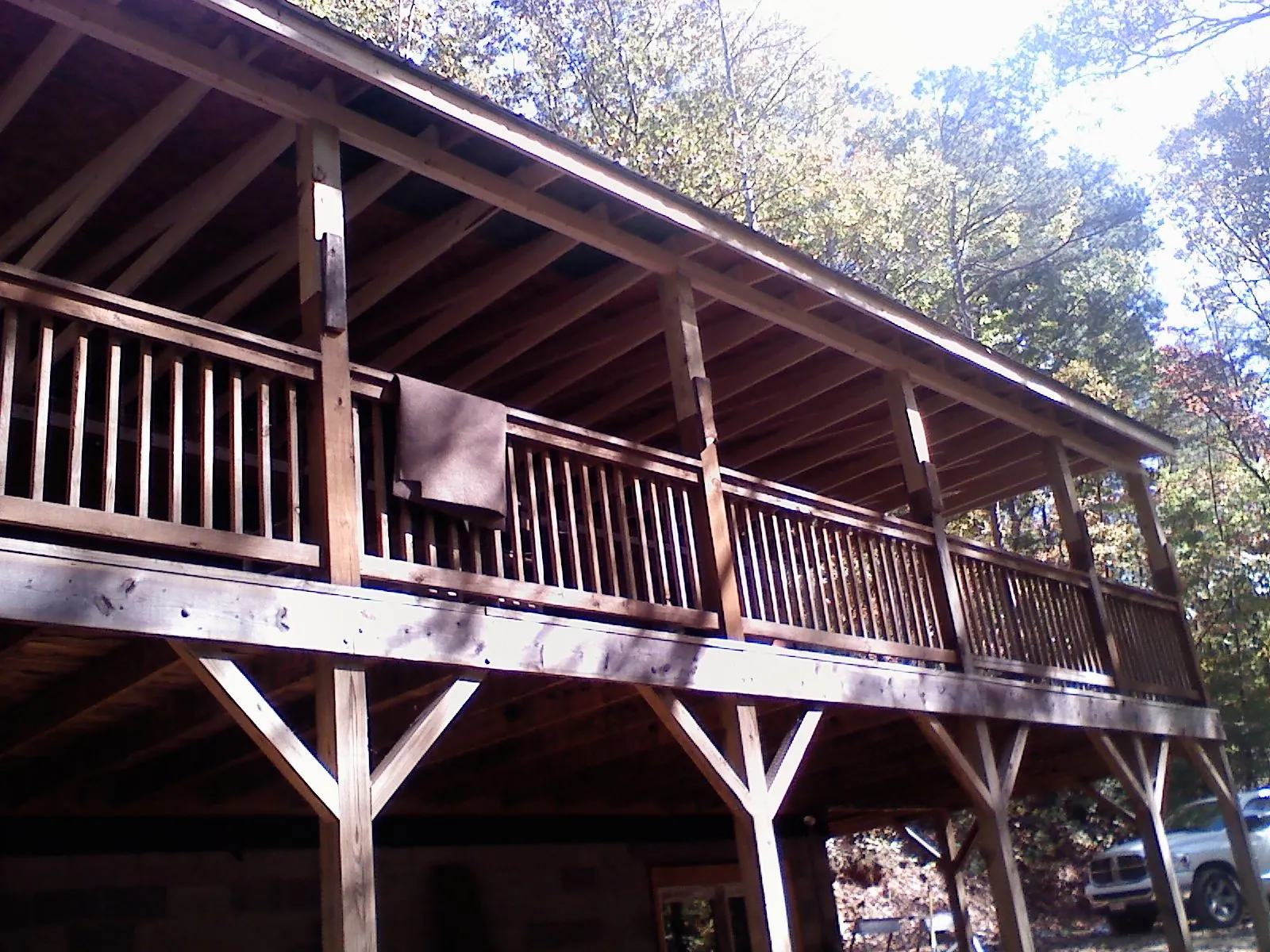 Timber framing under a new elevated porch and deck — Roof Leak Repair in Tarzana by Roofing Brothers